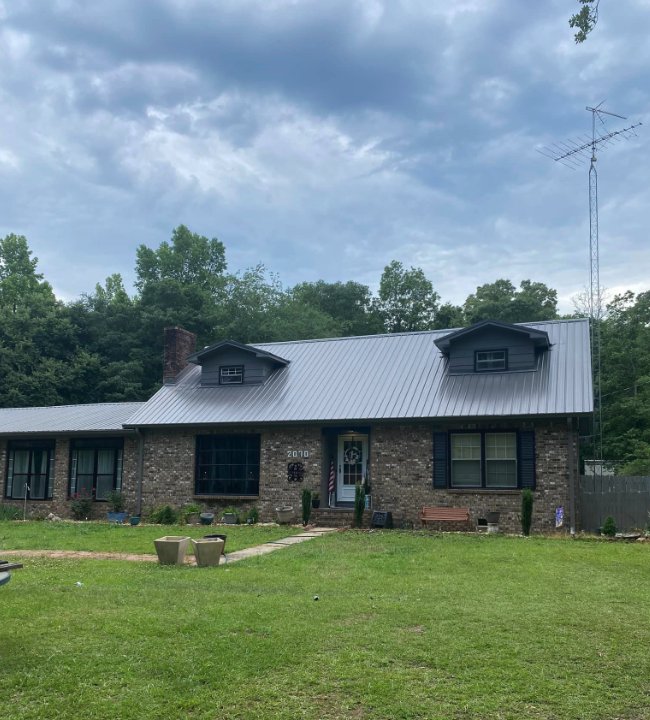 Slide of Backwoods Roofing