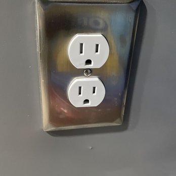 Grellis Construction - Under the outlet the nail is popping through it will eventually chip. - General Contractors Near Me - Upper Marlboro, Maryland