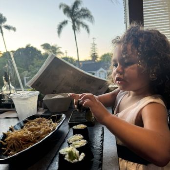 Yummy Sushi - Our toddler with her noodles & avocado roll - Sushi Bars Near Me - Coronado, California Yummy Sushi - Our toddler with her noodles & avocado roll - Sushi Bars Near Me - Coronado, California