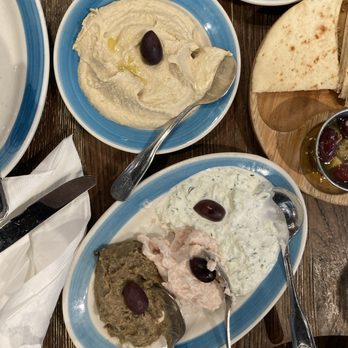 Meraki Taverna - Hummus and three types of cold spreads. - Greek Near Me - Armonk, New York Meraki Taverna - Hummus and three types of cold spreads. - Greek Near Me - Armonk, New York