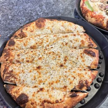 Rick's Pizza, Beer, & More - Pizza Near Me - Reno, Nevada Rick's Pizza, Beer, & More - Pizza Near Me - Reno, Nevada