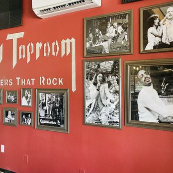 Spinal Taproom - a red wall with pictures of people - Beer Bar Near Me - Cedar Rapids, Iowa Spinal Taproom - a red wall with pictures of people - Beer Bar Near Me - Cedar Rapids, Iowa