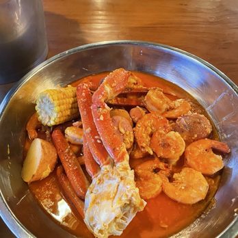 King Cajun Seafood & Bar - Snow crab and shrimp boil in a garlic butter sauce - Seafood Near Me - Niles, Ohio King Cajun Seafood & Bar - Snow crab and shrimp boil in a garlic butter sauce - Seafood Near Me - Niles, Ohio