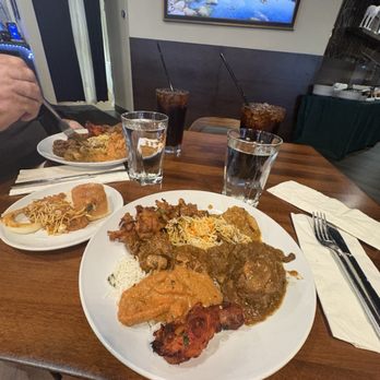 Indian Pavilion - A sampling of biryani, tandoori chicken, curried goat, butter chicken, mushroom Marsala, etc. - Desserts Near Me - Winter Garden, Florida