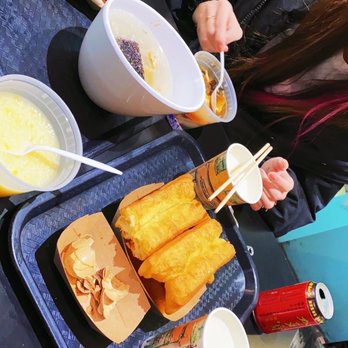 Délicieux Express - a woman eating a meal - Chinese Near Me - Montreal, Quebec Délicieux Express - a woman eating a meal - Chinese Near Me - Montreal, Quebec