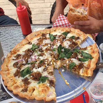 The Thirsty Sturgeon - Pulled pork pizza - Bars Near Me - Wolverine, Michigan