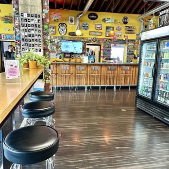 John’s Marketplace - Inside - there's a bar against the wall with plenty of seating - Beer, Wine & Spirits Near Me - Portland, Oregon John’s Marketplace - Inside - there's a bar against the wall with plenty of seating - Beer, Wine & Spirits Near Me - Portland, Oregon