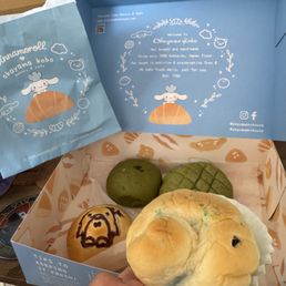 Cinnamoroll blueberry bread, chocolate emoji bread, matcha mochi an-pan and matcha sunrise Cinnamoroll blueberry bread, chocolate emoji bread, matcha mochi an-pan and matcha sunrise