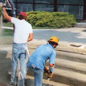Bunch W S - two men working on a fire hydrant - Painters Near Me - Omaha, Nebraska Bunch W S - two men working on a fire hydrant - Painters Near Me - Omaha, Nebraska