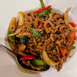 Rice Passions - Krapow Krapow beef with pepper, fresh onion and sweet basil leaves and garlic chili sauce.