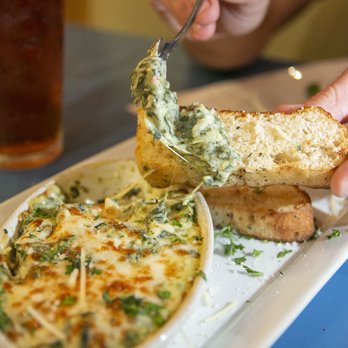 Reginelli's Pizzeria - spinach & artichoke dip - Pizza Near Me - New Orleans, Louisiana Reginelli's Pizzeria - spinach & artichoke dip - Pizza Near Me - New Orleans, Louisiana