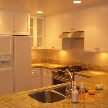 Radsun Kitchen Bath Flooring - a kitchen with a sink and refrigerator - General Contractors Near Me - Huntington Beach, California Radsun Kitchen Bath Flooring - a kitchen with a sink and refrigerator - General Contractors Near Me - Huntington Beach, California