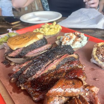 Terry Black's Barbecue - Cheddar jalapeño sausage, mixed brisket , pulled pork sandwich, mac and cheese, potato salad, and pecan pie - Barbeque Near Me - Austin, Texas Terry Black's Barbecue - Cheddar jalapeño sausage, mixed brisket , pulled pork sandwich, mac and cheese, potato salad, and pecan pie - Barbeque Near Me - Austin, Texas