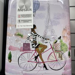 Marshalls - The carry-on roller luggage brown-skin woman