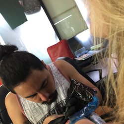 Mr Miyagi's Tattoo & Piercings - The artist at work.