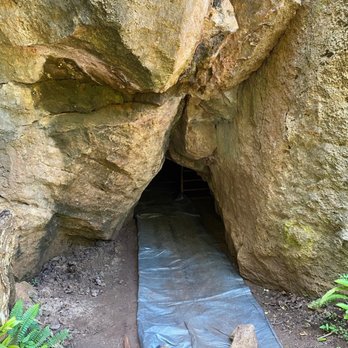Maha'ulepu Trail - The part where you have to crawl to reach the limestone caves - Hiking Near Me Maha'ulepu Trail - The part where you have to crawl to reach the limestone caves - Hiking Near Me