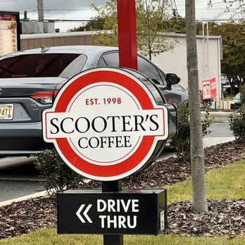Scooter's Coffee - a sign for a drive thru - Coffee & Tea Near Me - Huntsville, Alabama Scooter's Coffee - a sign for a drive thru - Coffee & Tea Near Me - Huntsville, Alabama