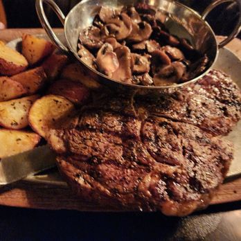 Casagranda's Steakhouse - Roasted red potatoes, medium rare ribeye with mushroom topper (enought to share). - Steakhouses Near Me - Butte, Montana Casagranda's Steakhouse - Roasted red potatoes, medium rare ribeye with mushroom topper (enought to share). - Steakhouses Near Me - Butte, Montana