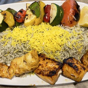 Kasra Persian Grill - KASRA COMBO with Chicken and Salmon kabobs - Middle Eastern Near Me - Houston, Texas Kasra Persian Grill - KASRA COMBO with Chicken and Salmon kabobs - Middle Eastern Near Me - Houston, Texas