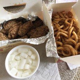 Soy garlic wings, curly fries and pickled radish Soy garlic wings, curly fries and pickled radish