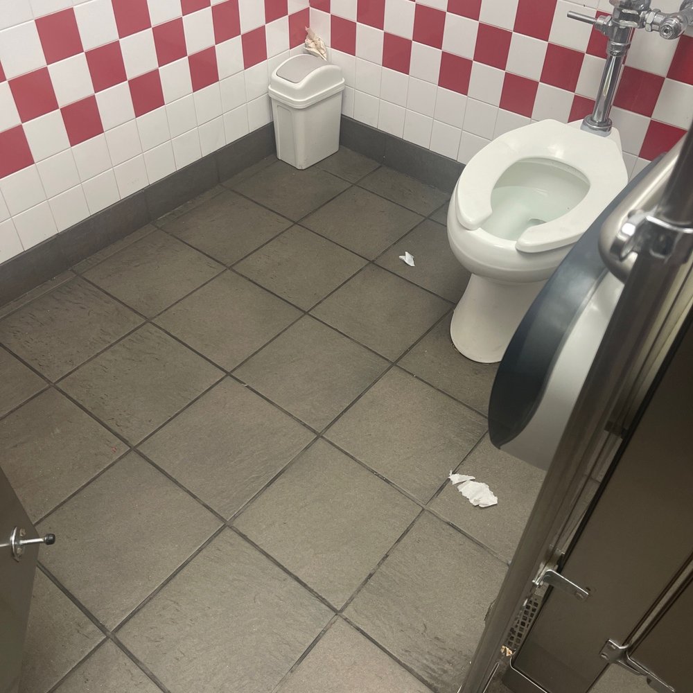 Five Guys - a toilet and a trash can in a public restroom - Burgers Near Me - Columbia, South Carolina Five Guys - a toilet and a trash can in a public restroom - Burgers Near Me - Columbia, South Carolina