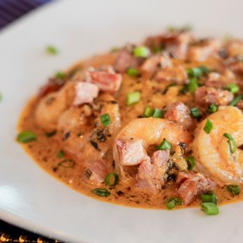5 Under Golf Center - Mardi Gras Shrimp & Grits - pork belly, jumbo shrimp, and our spicy New Orleans butter and cream - Golf Equipment Near Me - Beaumont, Texas