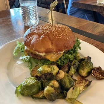 Bushfire Kitchen - Eastvale - Bushfire burger with side of brussels sprouts - Gluten-Free Near Me - Eastvale, California Bushfire Kitchen - Eastvale - Bushfire burger with side of brussels sprouts - Gluten-Free Near Me - Eastvale, California