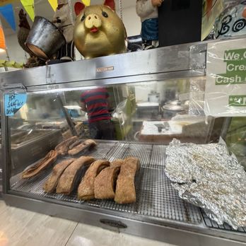 Pinoy One Outlet - Look at the lechon pork belly - International Grocery Near Me - Honolulu, Hawaii