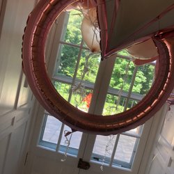 Balloon World Westchester - Balloons arrived tangled and to the wrong house! Had to cut them out a gate the had put them on in the wrong location. TERRIBLE