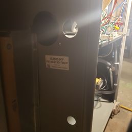 Plugs missing from a sealed combustion unit are a no no, these should be plugged as it reduces efficiency.