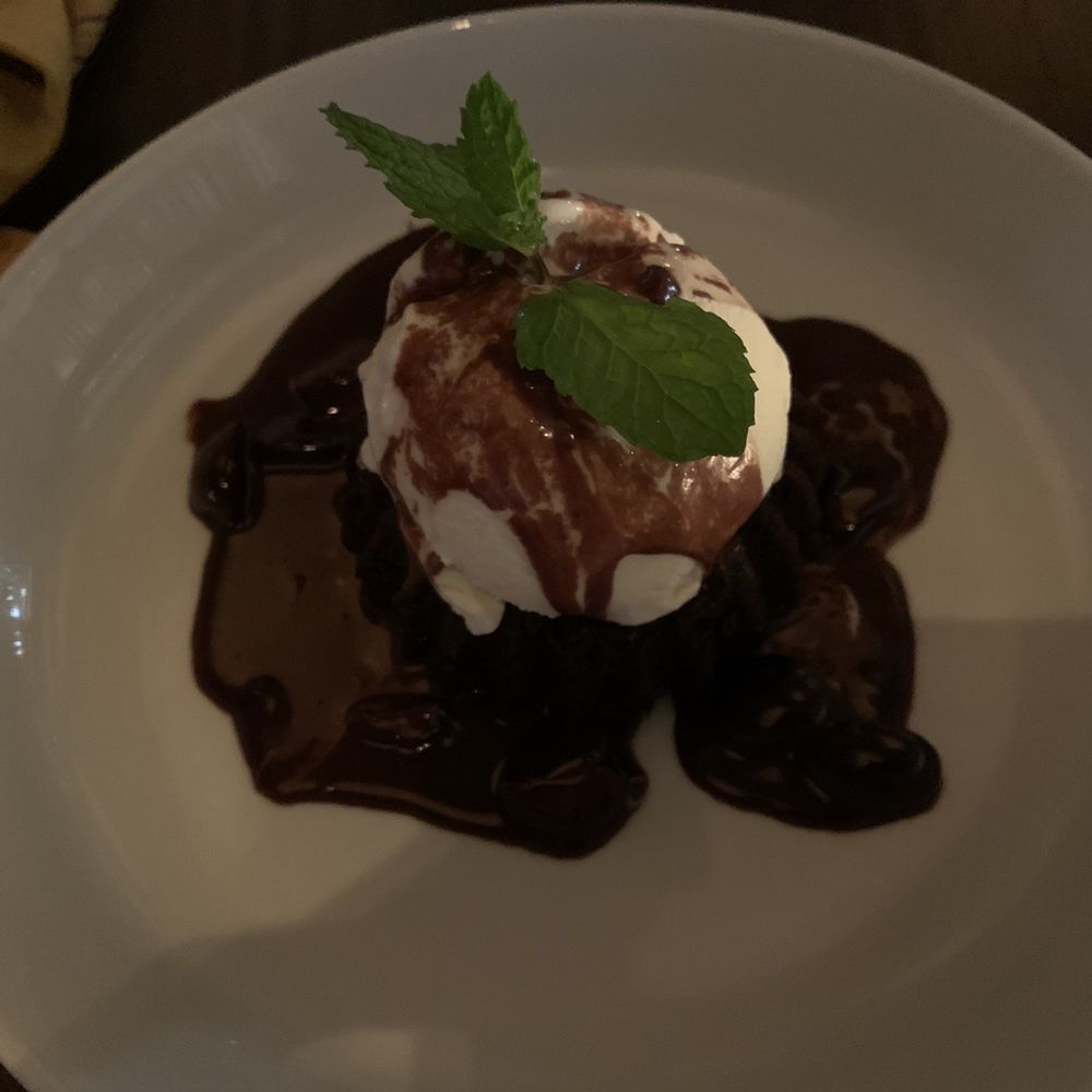 Henry's Palm Beach - Chocolate lava cake with ice cream - Bars Near Me - Palm Beach, Florida Henry's Palm Beach - Chocolate lava cake with ice cream - Bars Near Me - Palm Beach, Florida
