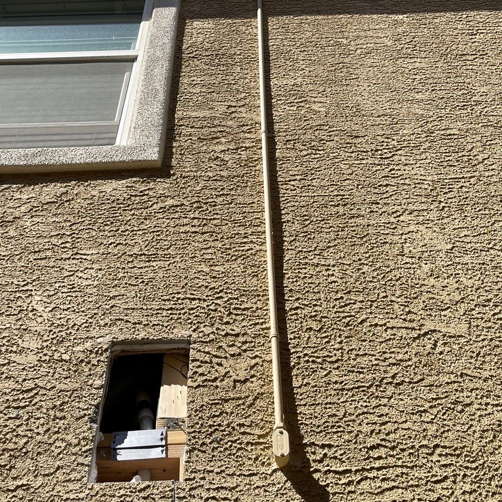 That cut out is where they broke the water pipe. The stucco guy is suppose to repair it this Sunday.