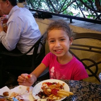 Heroes - She enjoyed the pastrami fries and added regular fries - American Near Me - Riverside, California