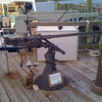 Olympus Dive Center - 20mm deck gun recovered from the U-352. The wreck was discovered by George Purifoy, founder of the dive shop. - Dive Shops Near Me - Morehead City, North Carolina Olympus Dive Center - 20mm deck gun recovered from the U-352. The wreck was discovered by George Purifoy, founder of the dive shop. - Dive Shops Near Me - Morehead City, North Carolina