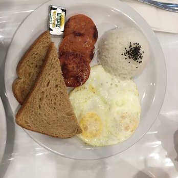 Aloha Kitchen - Breakfast plate with toast, over medium eggs, rice, and Portuguese sausage. - Breakfast & Brunch Near Me - Honolulu, Hawaii
