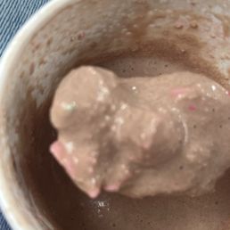 Clumps of frosting not mixed properly.