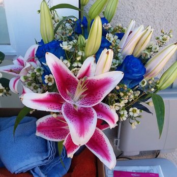 Maggie's Flowers - My bridal bouquet (blue roses & starfire lilies) - Florists Near Me - San Fernando, California Maggie's Flowers - My bridal bouquet (blue roses & starfire lilies) - Florists Near Me - San Fernando, California