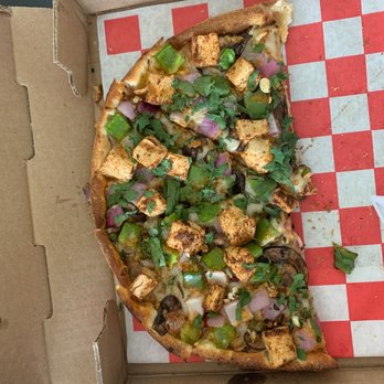 Pizza Twist - This is the vegan tikka masala. What's left of it anyway....we thought it was delicious! - Pizza Near Me - Redding, California Pizza Twist - This is the vegan tikka masala. What's left of it anyway....we thought it was delicious! - Pizza Near Me - Redding, California