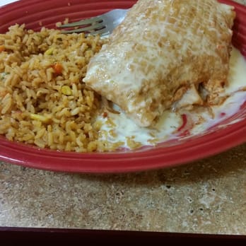 El Sol - Chicken Chimichanga fried & covered in Queso Cheese Sauce - Mexican Near Me - Pine Bluff, Arkansas El Sol - Chicken Chimichanga fried & covered in Queso Cheese Sauce - Mexican Near Me - Pine Bluff, Arkansas