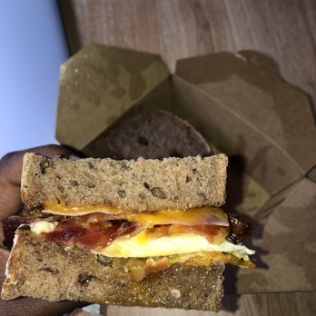 Purple Carrot Bread - Breakfast Panini: Eggs, candied bacon and ham and cheddar cheese on a cinnamon raisin - Cafes Near Me - Lowell, Massachusetts