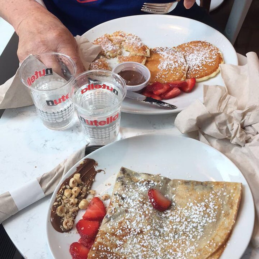 Nutella Cafe - Nutella crepe with strawberries and buttermilk pancakes with Nutella. - Desserts Near Me - Chicago, Illinois