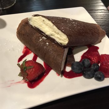 Palio - The Chocolate Crepe - the fresh berries and raspberry sauce compliment it perfectly - Italian Near Me - Grand Rapids, Michigan Palio - The Chocolate Crepe - the fresh berries and raspberry sauce compliment it perfectly - Italian Near Me - Grand Rapids, Michigan