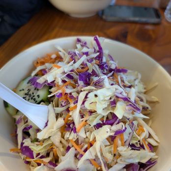 Astoria Co+op - Peanut Chicken Sesame Noodle Salad, $8.99 (shown in bowl that is available for customers to use when dining in) - Grocery Near Me - Astoria, Oregon