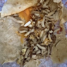 I had to dig thru the burrito to find what very little bits of bacon and eggs in this #24 burrito at the Bradshaw Adalbertos.