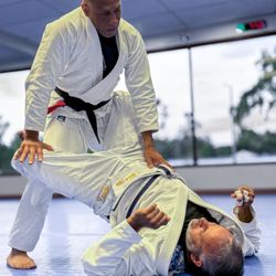 Gracie Martial Arts & Self Defense Tampa - Saulo demonstrating how to open a closed guard