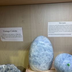 Large stones of calcite with more information on it behind them