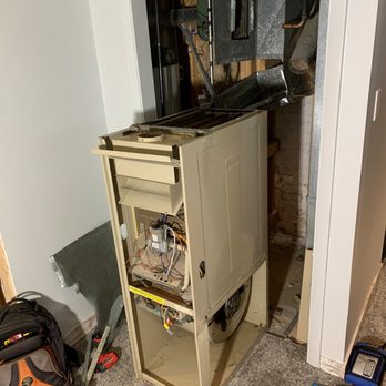 AL's Cooling & Heating - Old furnace being removed. - Heating & Air Conditioning/HVAC Near Me - Oak Brook, Illinois