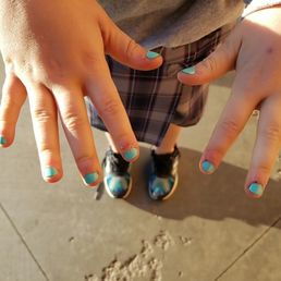 Admittedly, my 9 year-old daughter picks at her nails so we wanted to get a manicure to get her cuticles cleaned up. Cuticles are no better.