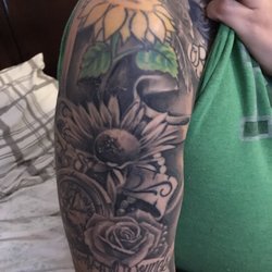 J-Fam Tattoos - Love my wife's new tattoo also!!!