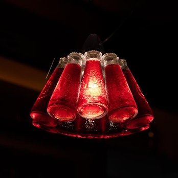 84 Yesler - Campari bottle lighting - Italian Near Me - Seattle, Washington 84 Yesler - Campari bottle lighting - Italian Near Me - Seattle, Washington